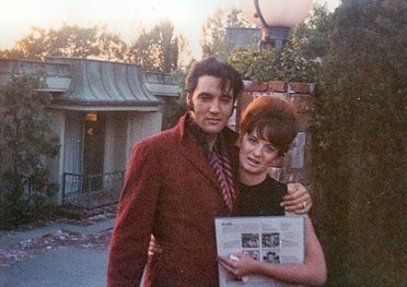 Elvis Presley outside of his house on Hillcrest in Beverly Hills, California
